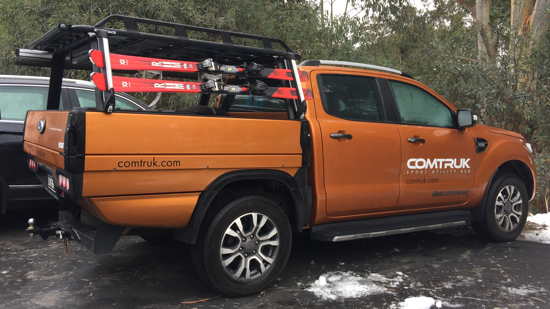 Haul gear for skiing with Sport Utility Bed operable truck bed